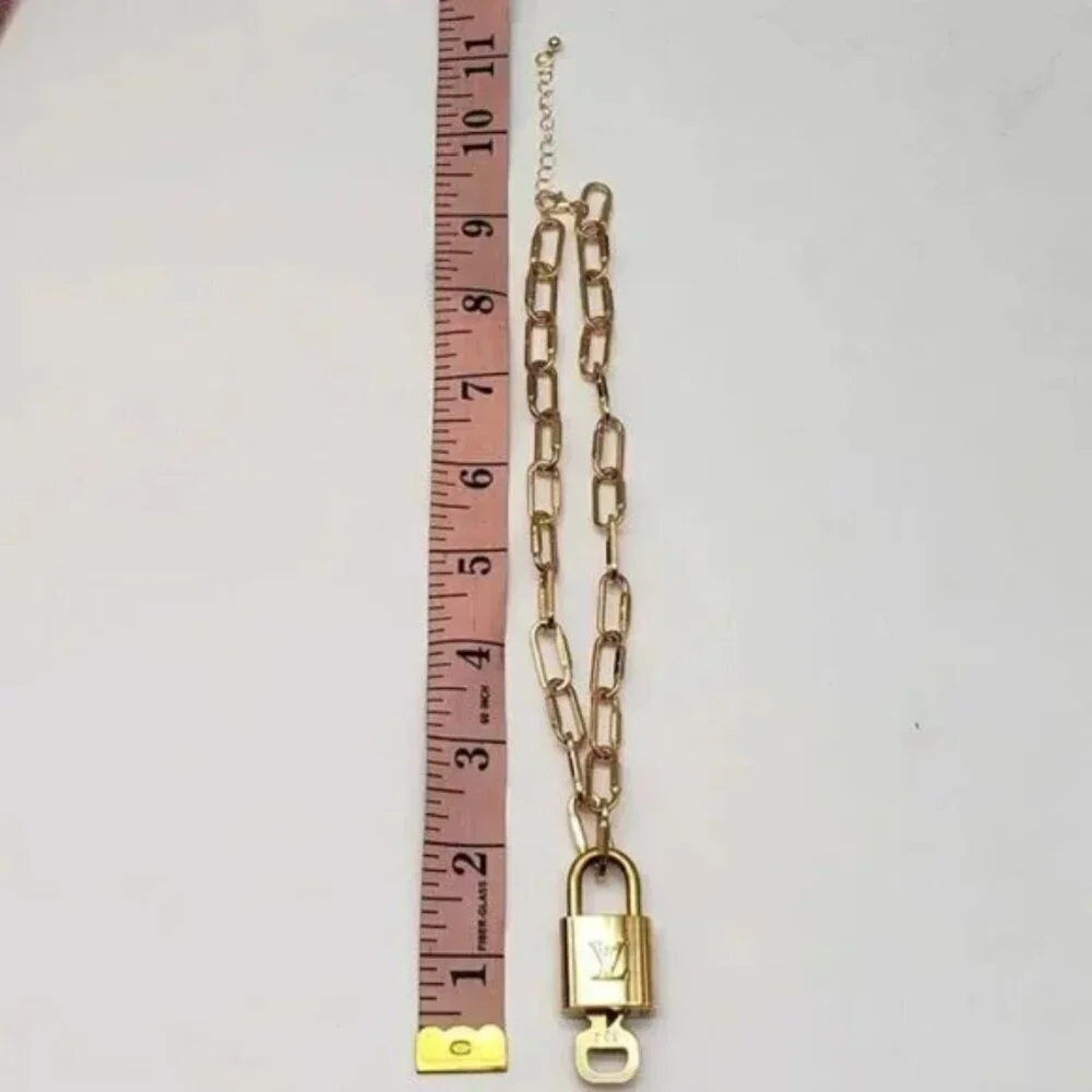 Authentic Louis Vuitton Lock and Key Gold Color with Gold Plated Chain Necklace